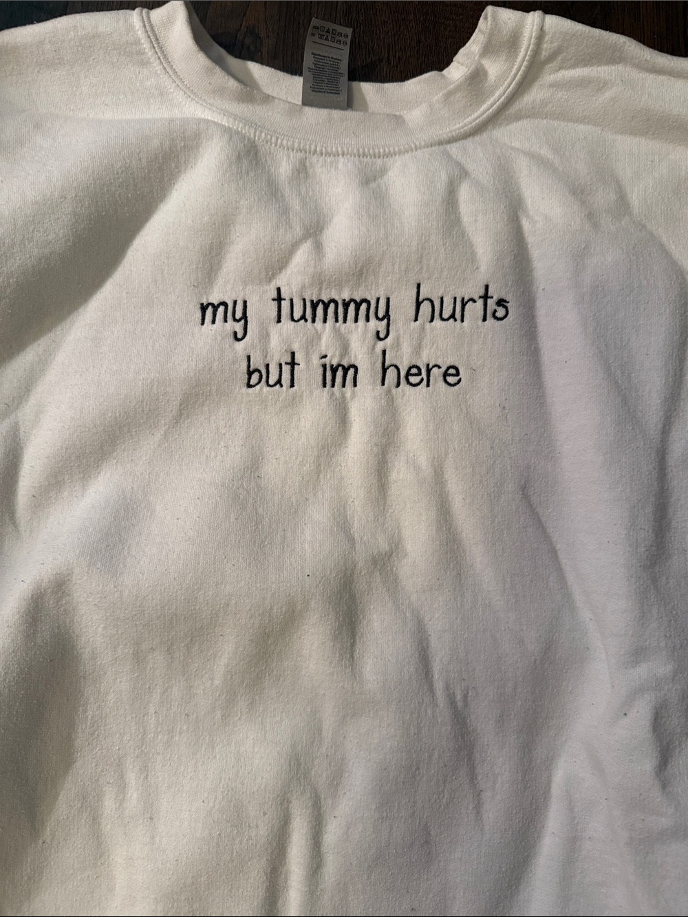 Amazon White Sweatshirt with Black Text "my tummy hurts but im here" - Picture 2 of 3